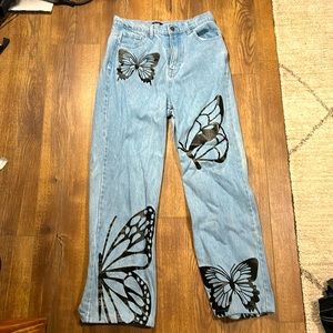 Simple Society Blue jeans With black butterfly print
